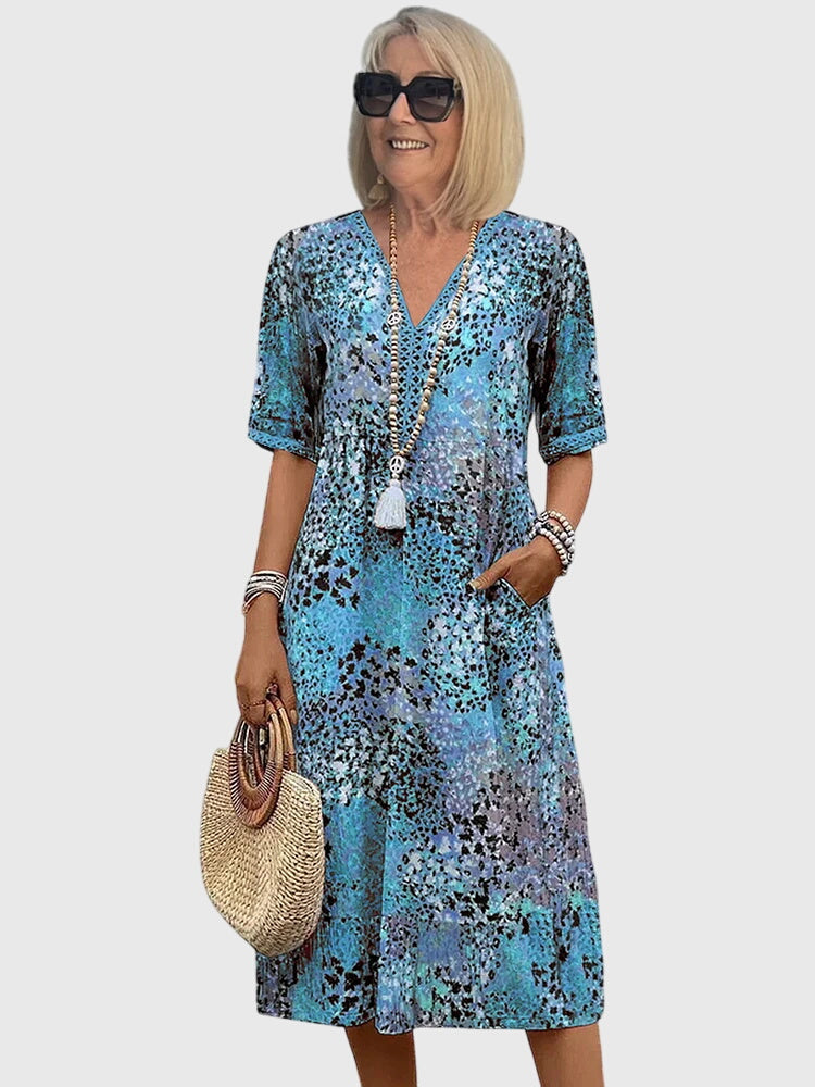 Women's Floral Print V-Neck Half-Sleeve Midi Dress with Side Pockets