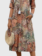 Women's Floral Print V-Neck Half-Sleeve Midi Dress with Side Pockets