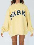 Women's Oversized Mockneck Sweatshirt with Collegiate Arched Letter Graphic